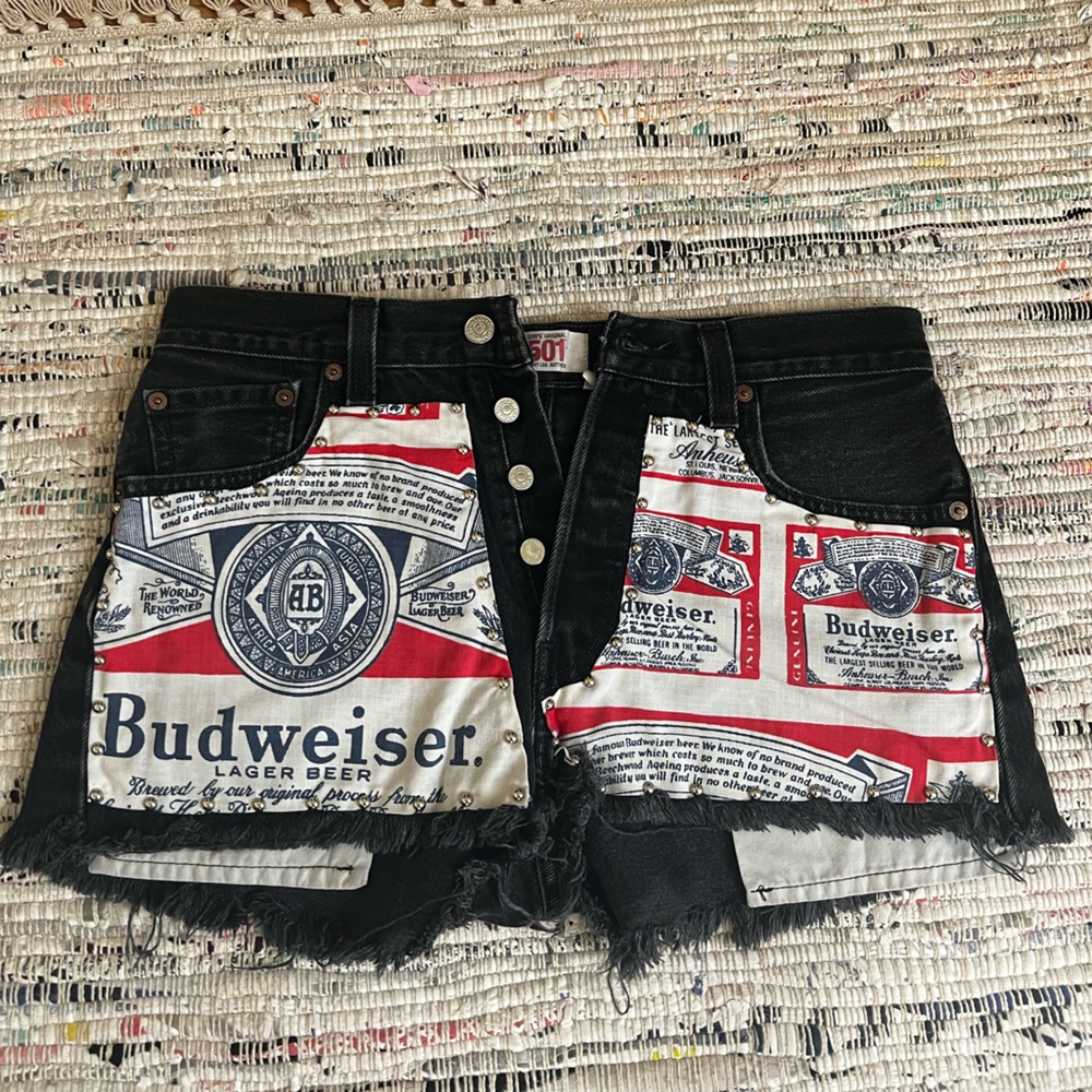 Vintage Levi’s 501 cutoff shorts studded Budweiser decal